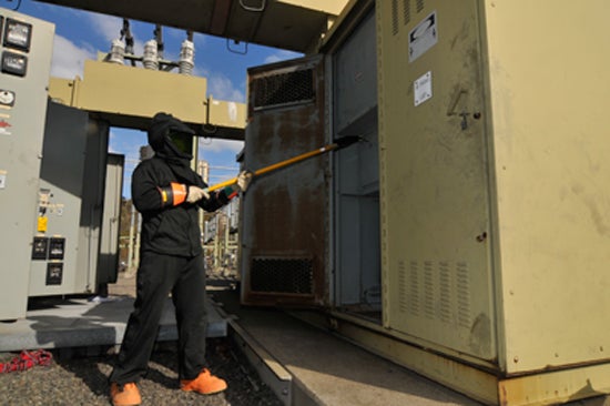 PSE&G worker cleans equipment
